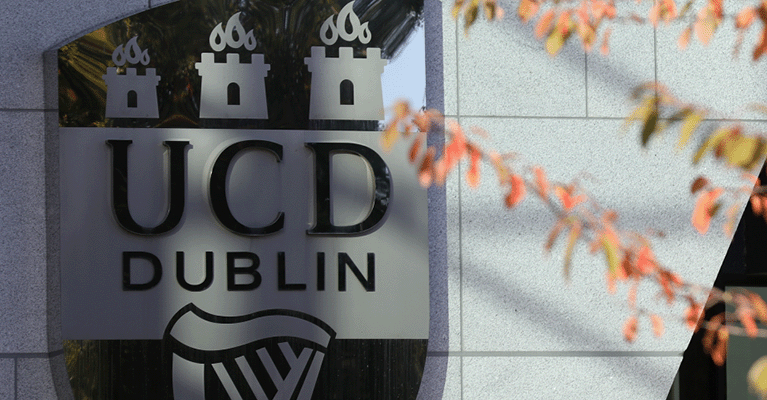 The UCD crest on the side of the O'Brien Centre for Science.